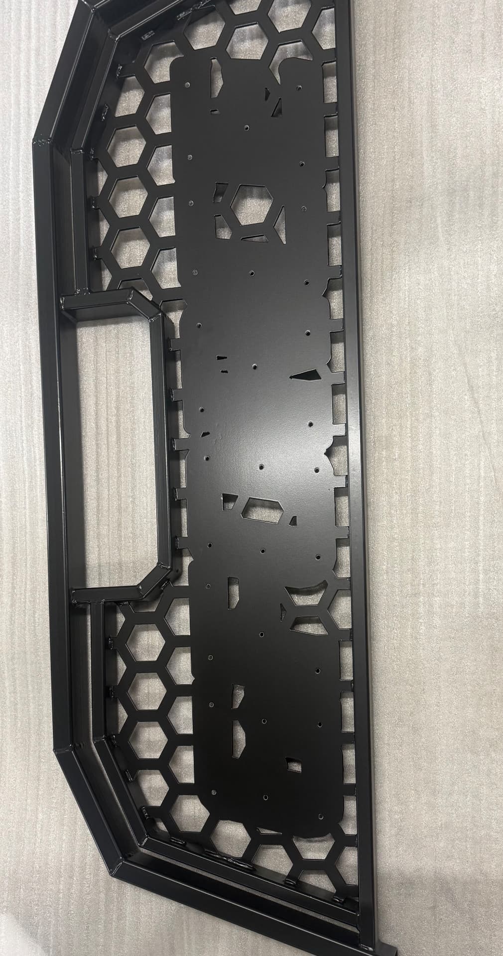 Black textured metal panel