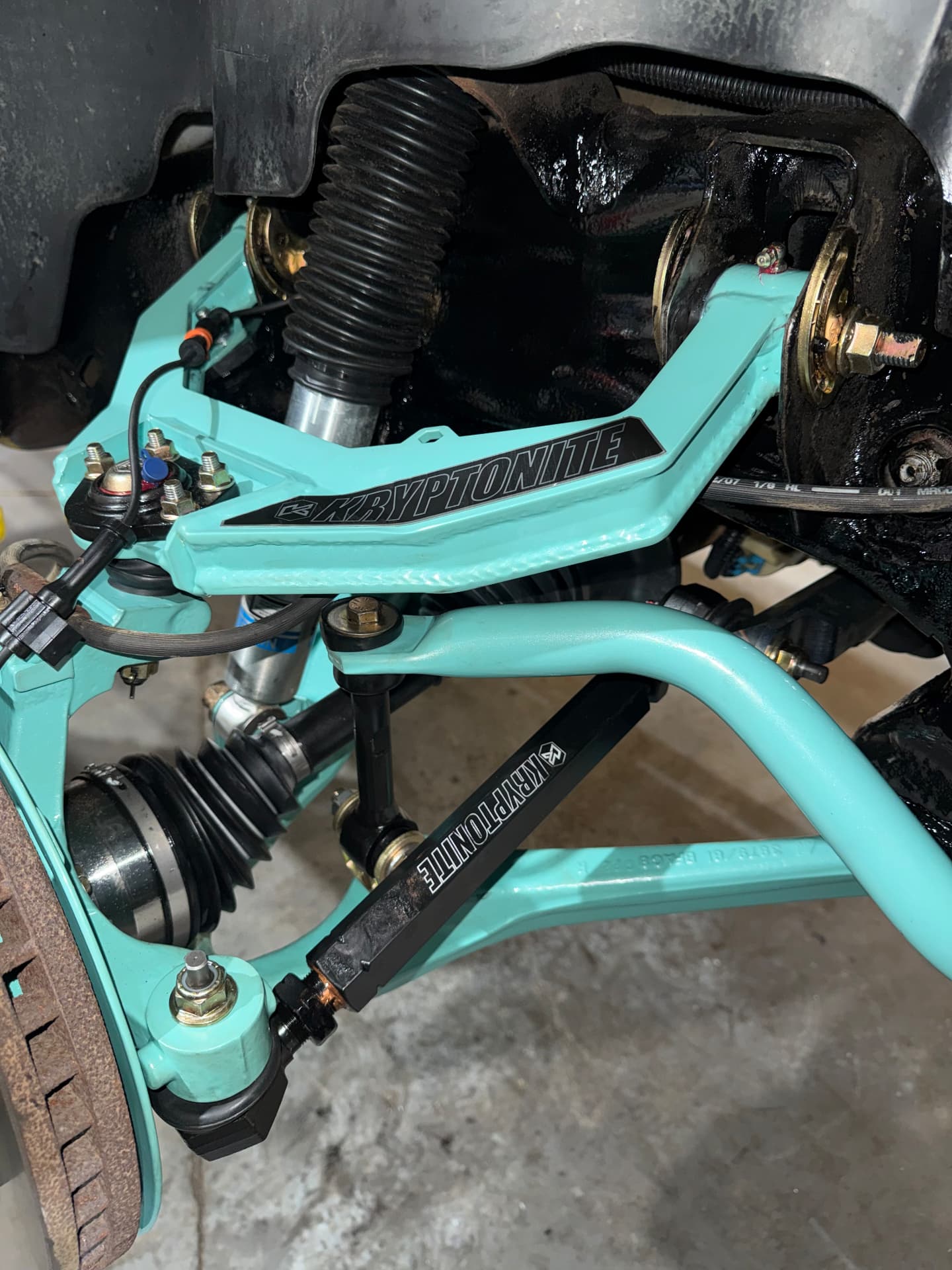 Teal Kryptonite control arms